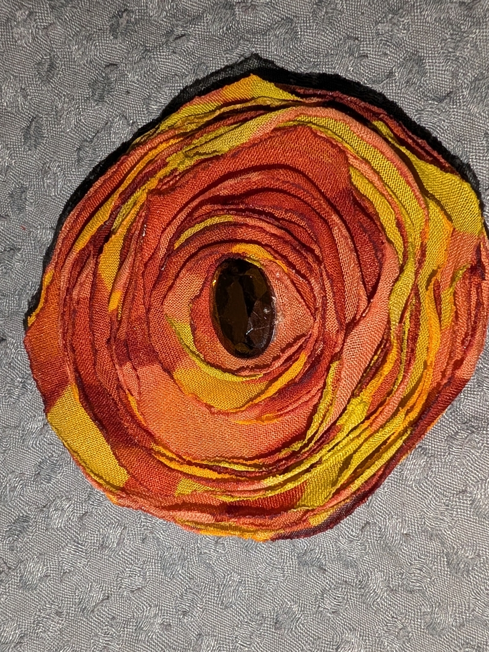 Floral Fabric Hair Clip in Orange & Yellow with Amber Center